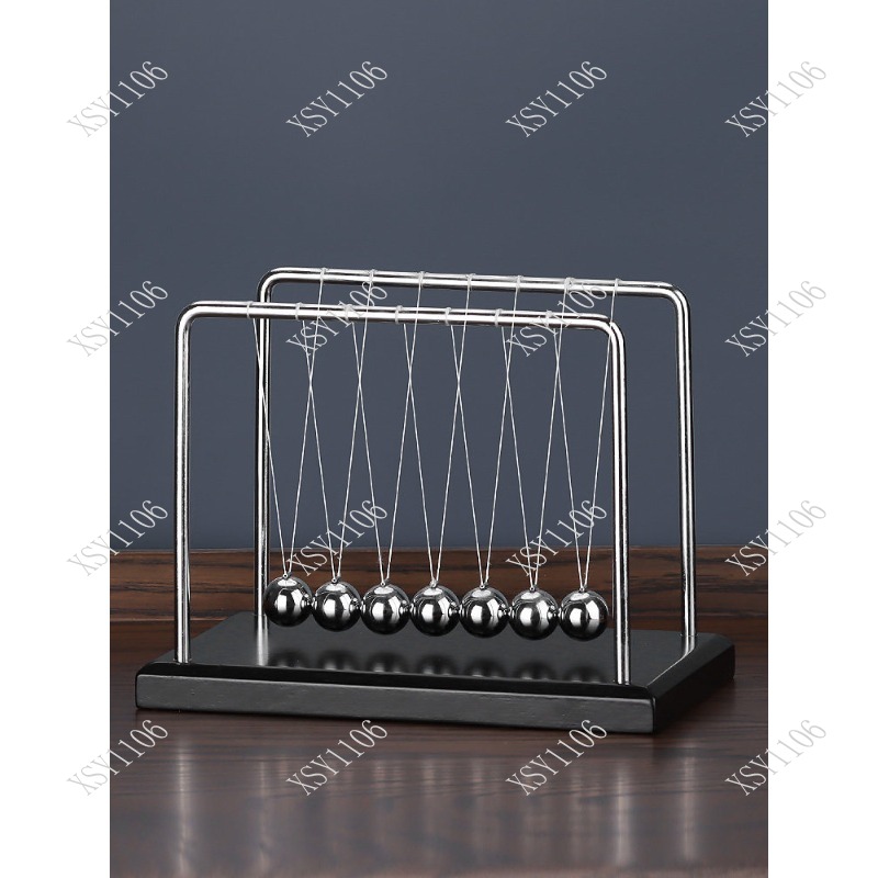 مهد نيوتن ذو 7 كرات لتوازن الك - مراجعة Newton Cradle Large وسعره