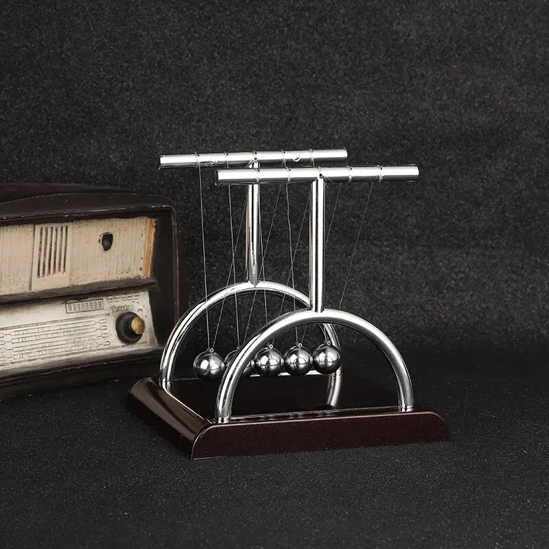 نيوتن مهد التوازن الصلب الكرة  - مراجعة Newton Cradle Large وسعره